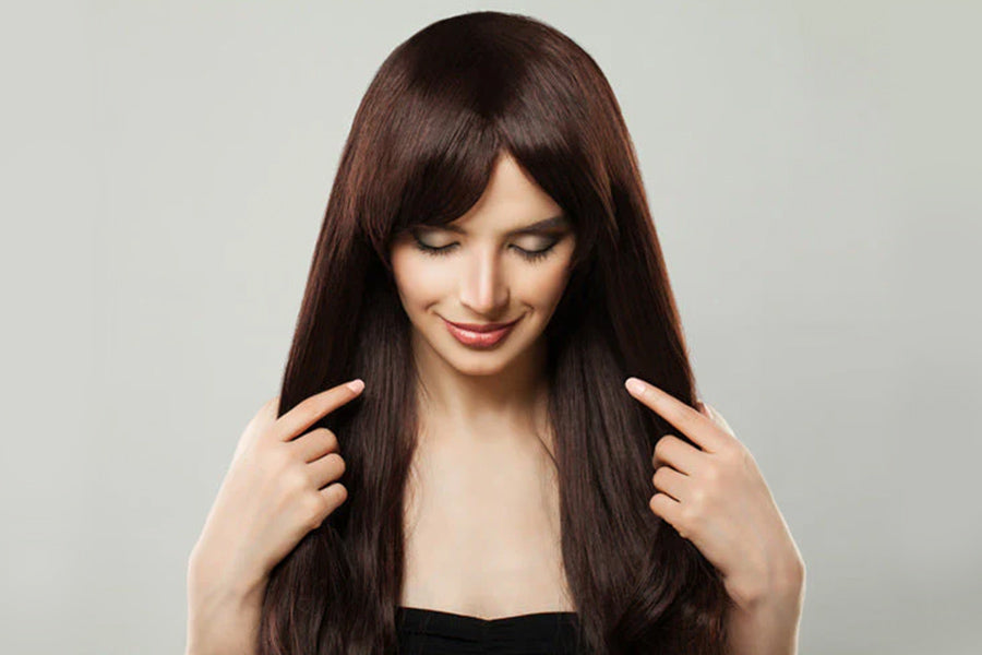 Haarteile/Topper vs. Extensions: Was ist besser für mehr Volumen?